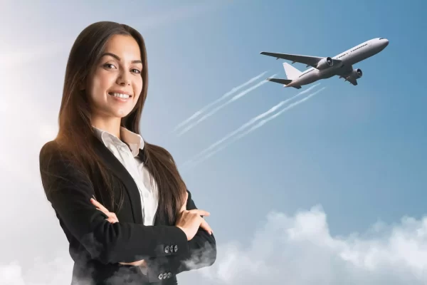 attractive-smiling-young-european-businesswoman-standing-sky-background-with-airplane-success-business-trip-concept-1-66d4431244bbb