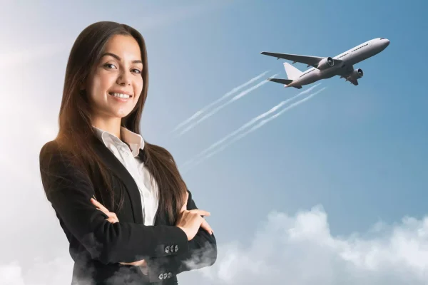 attractive-smiling-young-european-businesswoman-standing-sky-background-with-airplane-success-business-trip-concept-1-66d4431244bbb